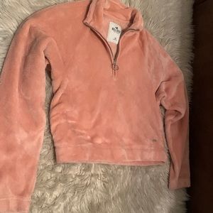 Pink Hollster sweater.